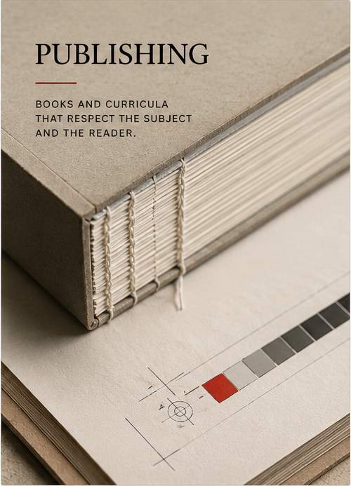 Close view of a carefully bound book and printed production marks, representing editorial craft and publishing infrastructure.